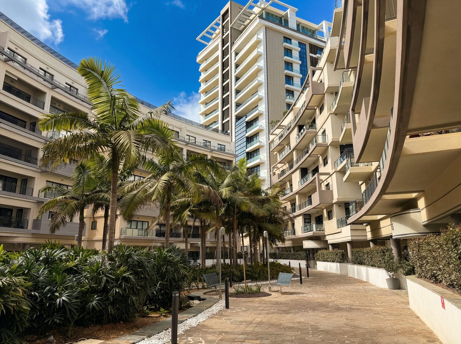 Deluxe 2 Bedroom Apartment — Pendergardens garden courtyard with palms, St Julian's, Malta