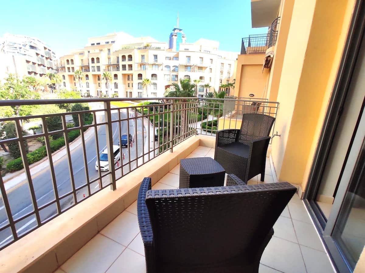 Deluxe Home Malta — balcony view of Portomaso complex, St Julian's, Malta