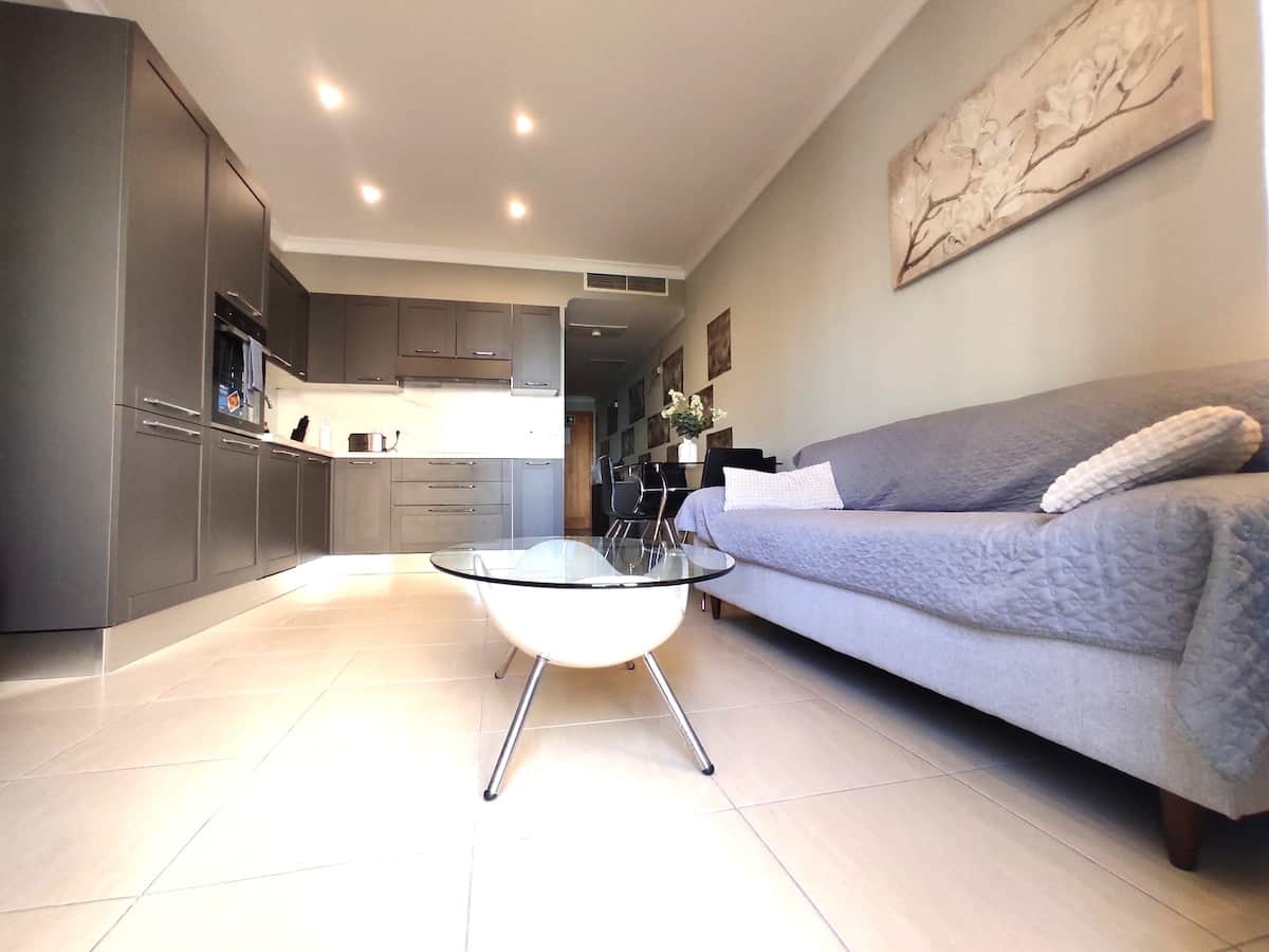 Deluxe Home Malta — living room and kitchen